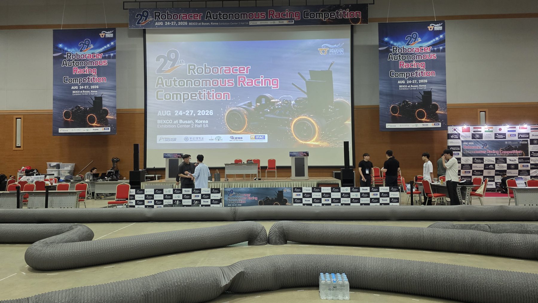 The Busan competition hall: the barrier-lined track in front of the RoboRacer stage
